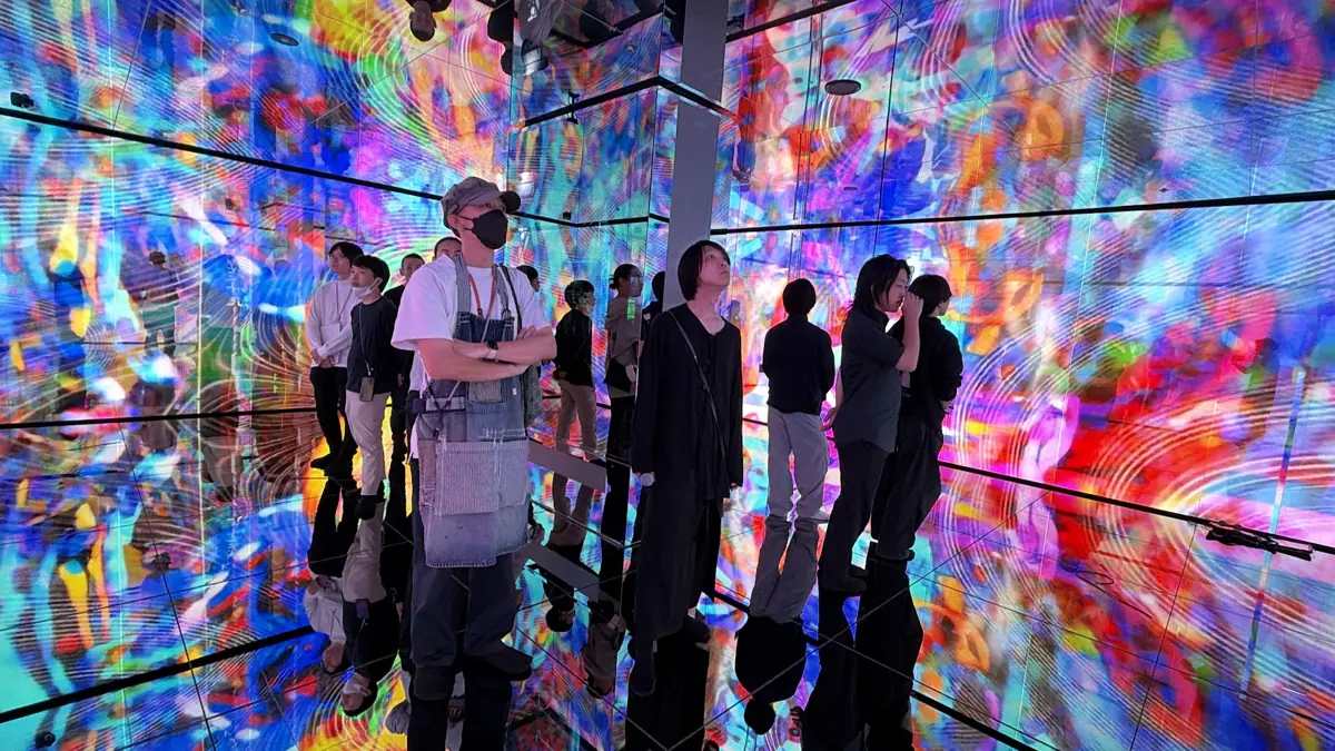 Visitors inside swirling colour in the First Room