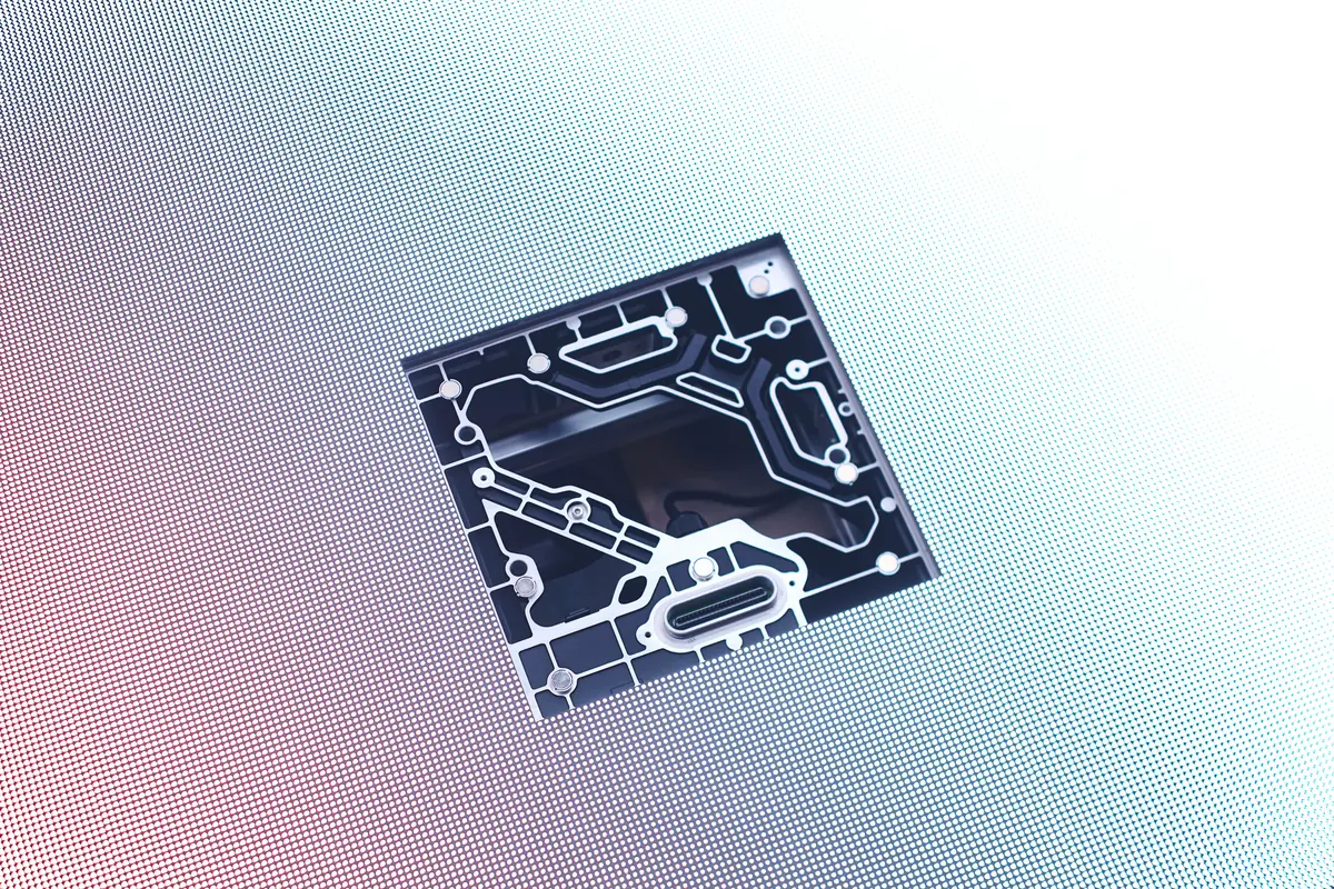 A circuit board floating in light